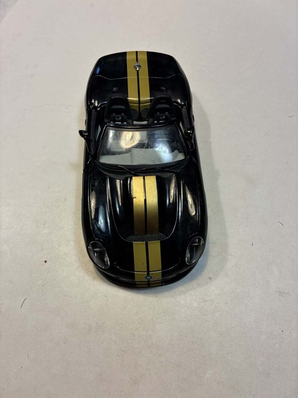 Bburago 1999 Shelby Series 1 Black with Gold Stripes 1/18 Diecast Model Car